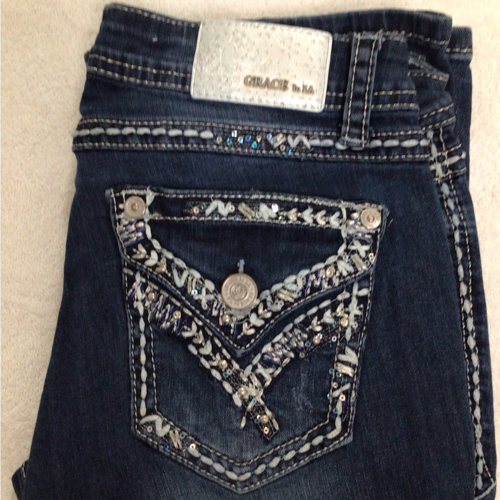 Grace in LA Jeans, embellished on pockets. Size 30/ 31 length